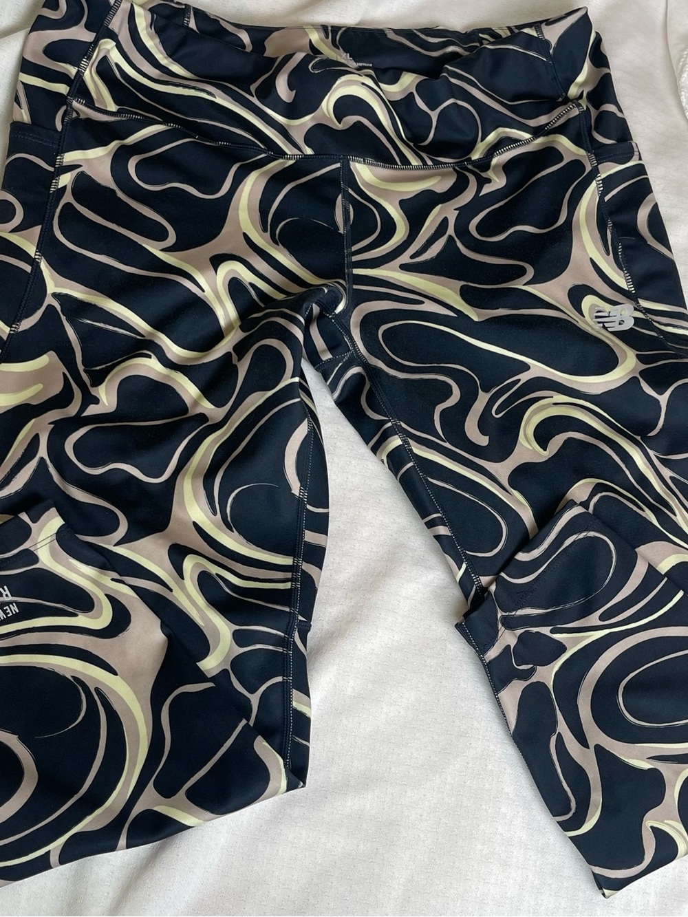 New Balance Blue Leggings with Beige Swirl Design